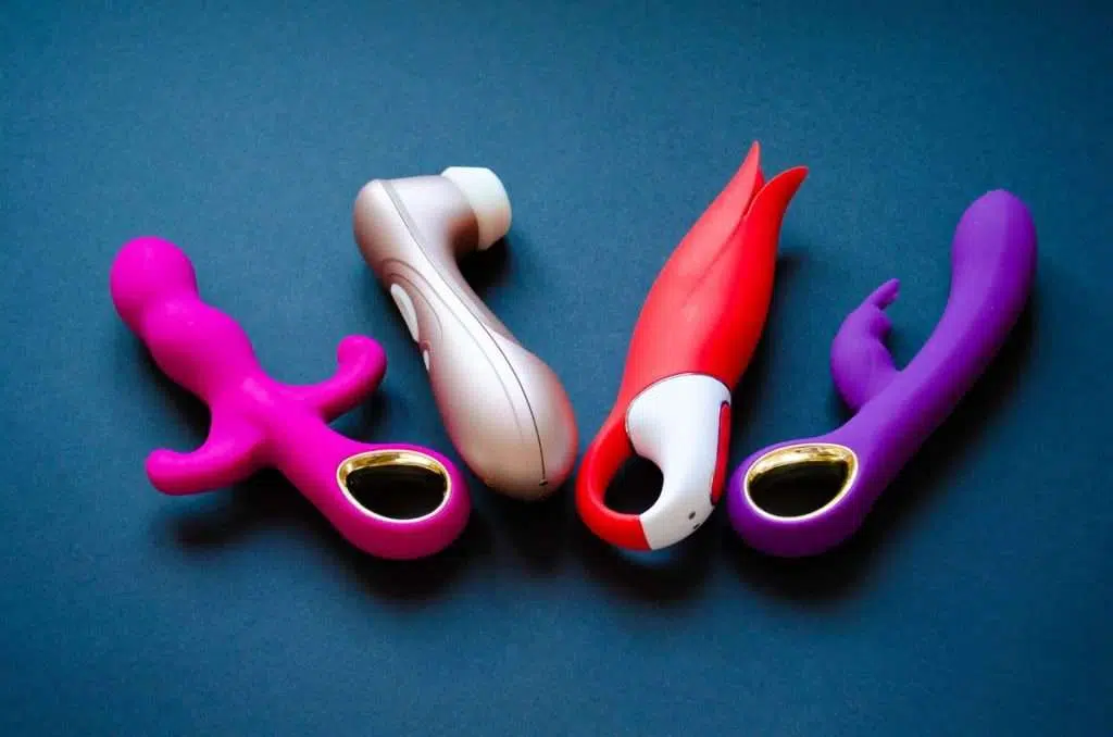 Four Sex Toys. Vibrators On A Black Background. Useful For Sex S